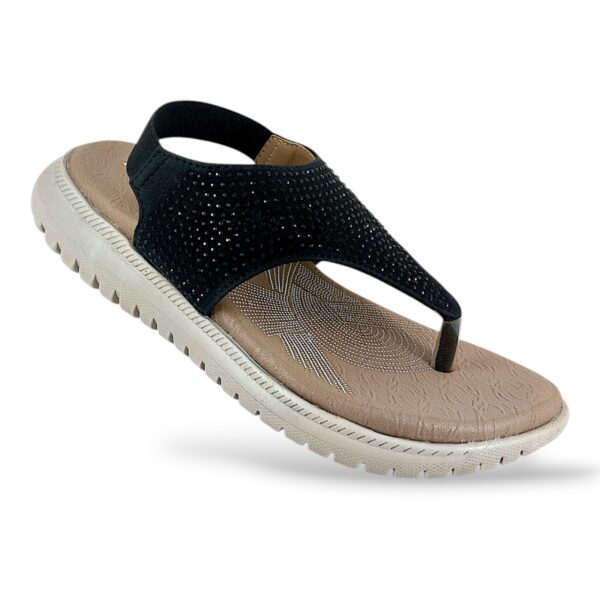 Women's flat sandals wholesale featuring an embellished T-strap design, elastic ankle back-strap, and a textured comfort sole.