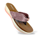 Comfortable women's wedge slippers wholesale featuring a textured cushioned sole and a wide padded strap.