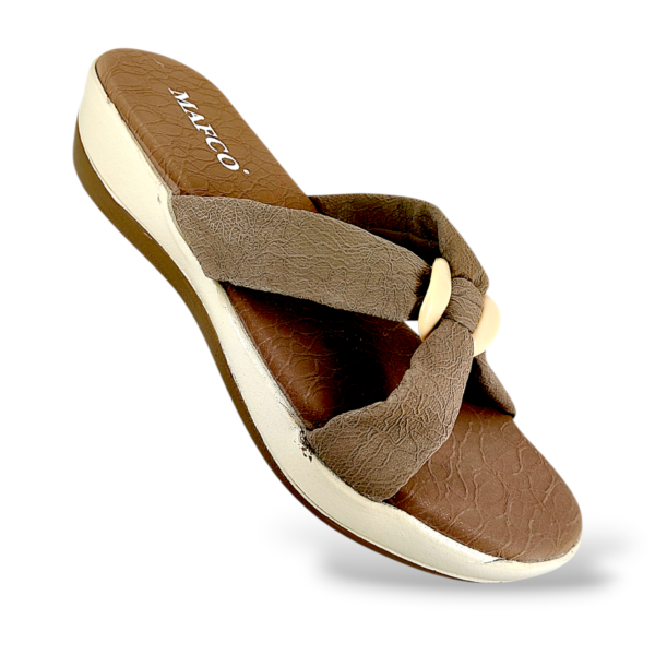 Women's wedge sandals wholesale with a textured crossover strap and durable wedge heel sole.