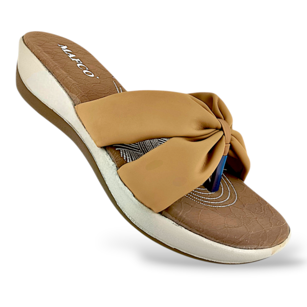 Women's wedge sandals wholesale with a textured footbed and a soft, gathered strap design.