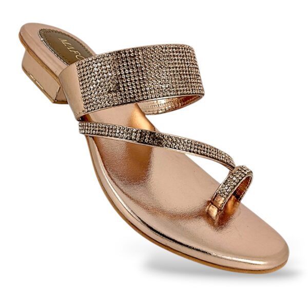 Women's flat sandals wholesale with a toe-ring strap and shiny embellishments.