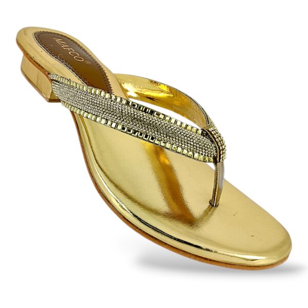 Women's low heel sandals wholesale featuring a metallic slip-on sole and a glittery rhinestone-embellished V-strap.