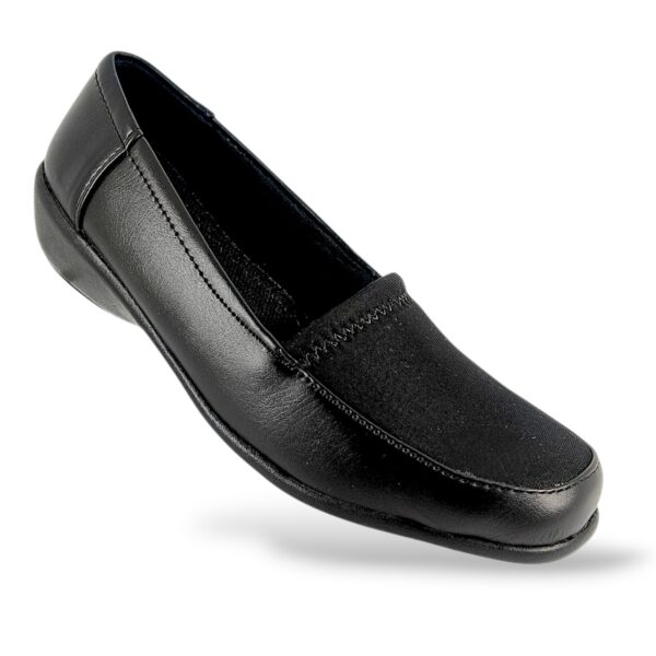 Women's casual shoes wholesale featuring a slip-on comfort design with a textured fabric vamp and sturdy sole.